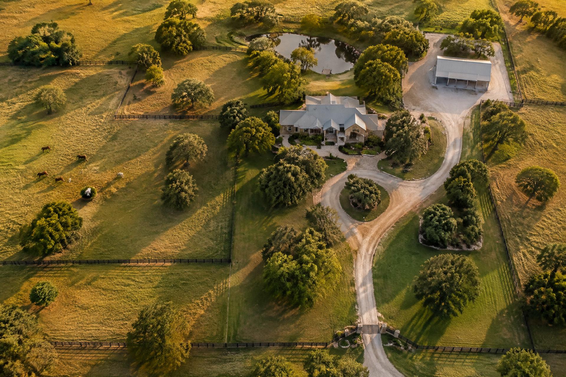 Aerial view of a Texas ranch property at golden hour
